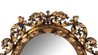 An Italian Rococo Style Giltwood Mirror