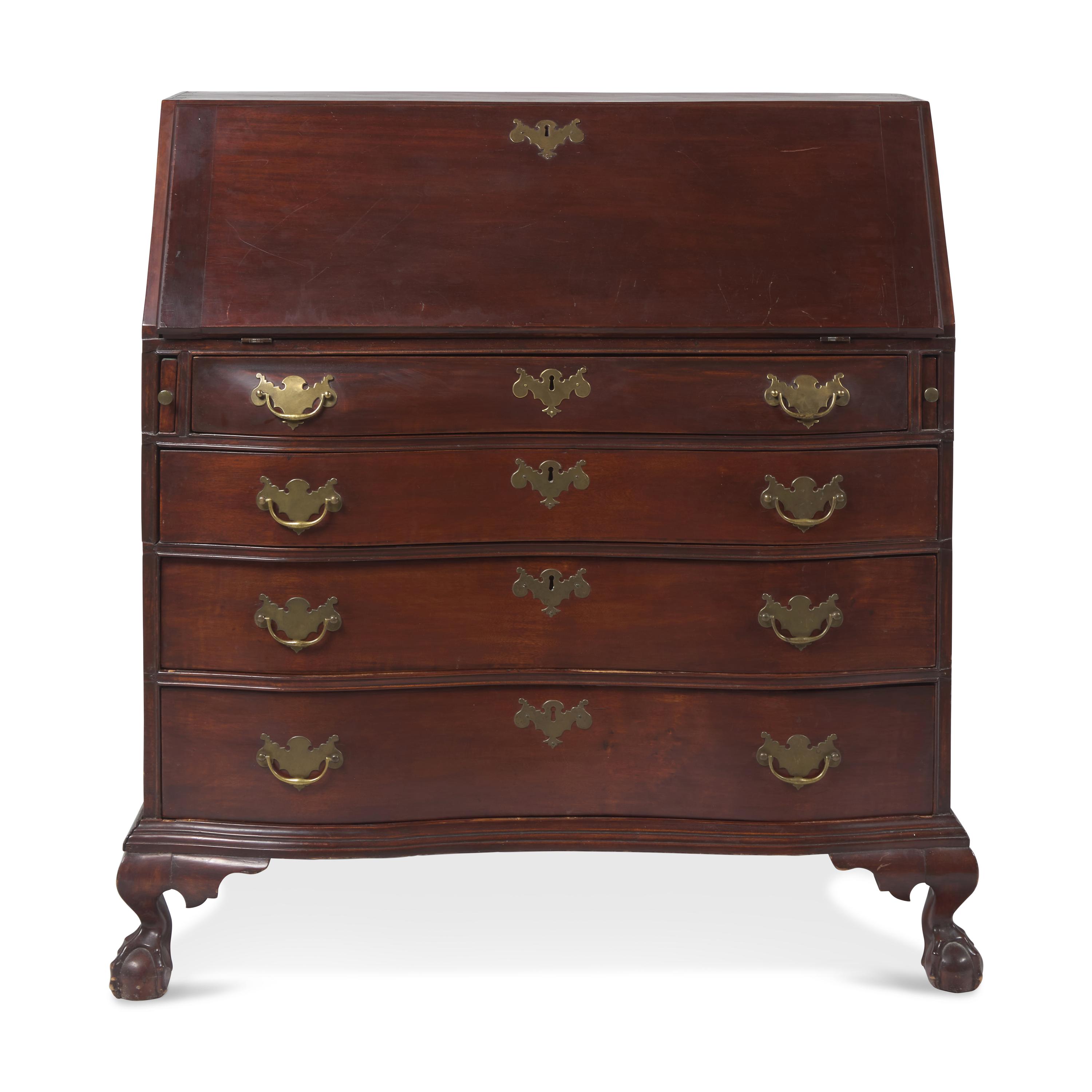 A Chippendale Carved Mahogany Oxbow Slant-Front Desk