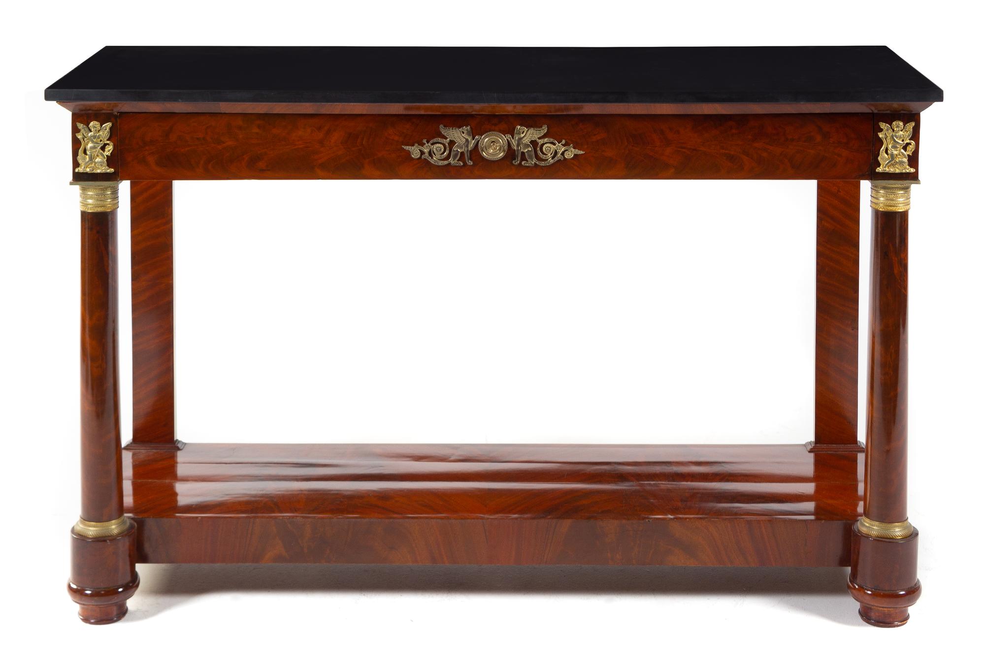 An Empire Mahogany Serving Table Height 33 1/4 x width 54 1/2 inches. — 19TH CENTURY