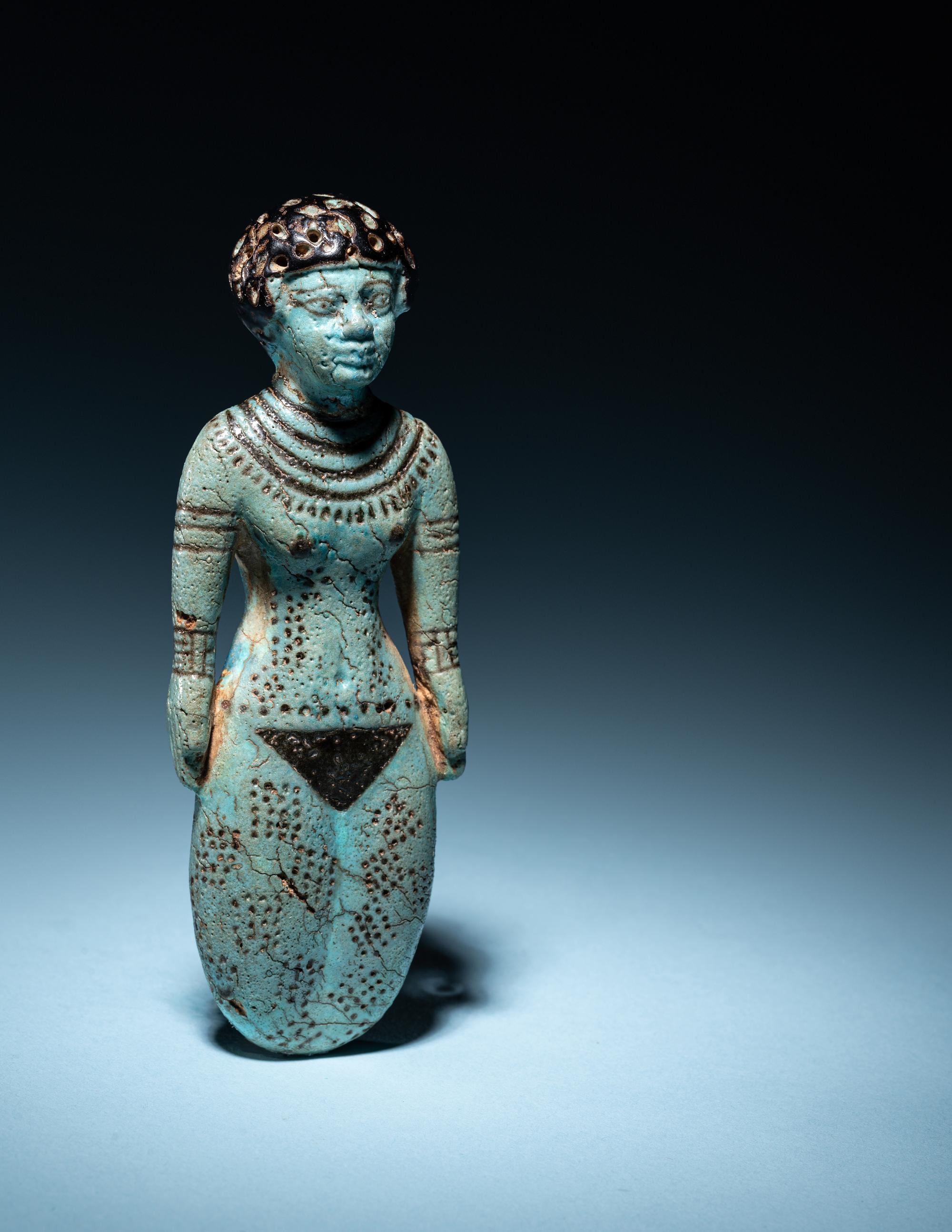 An Egyptian Faience Female Figure