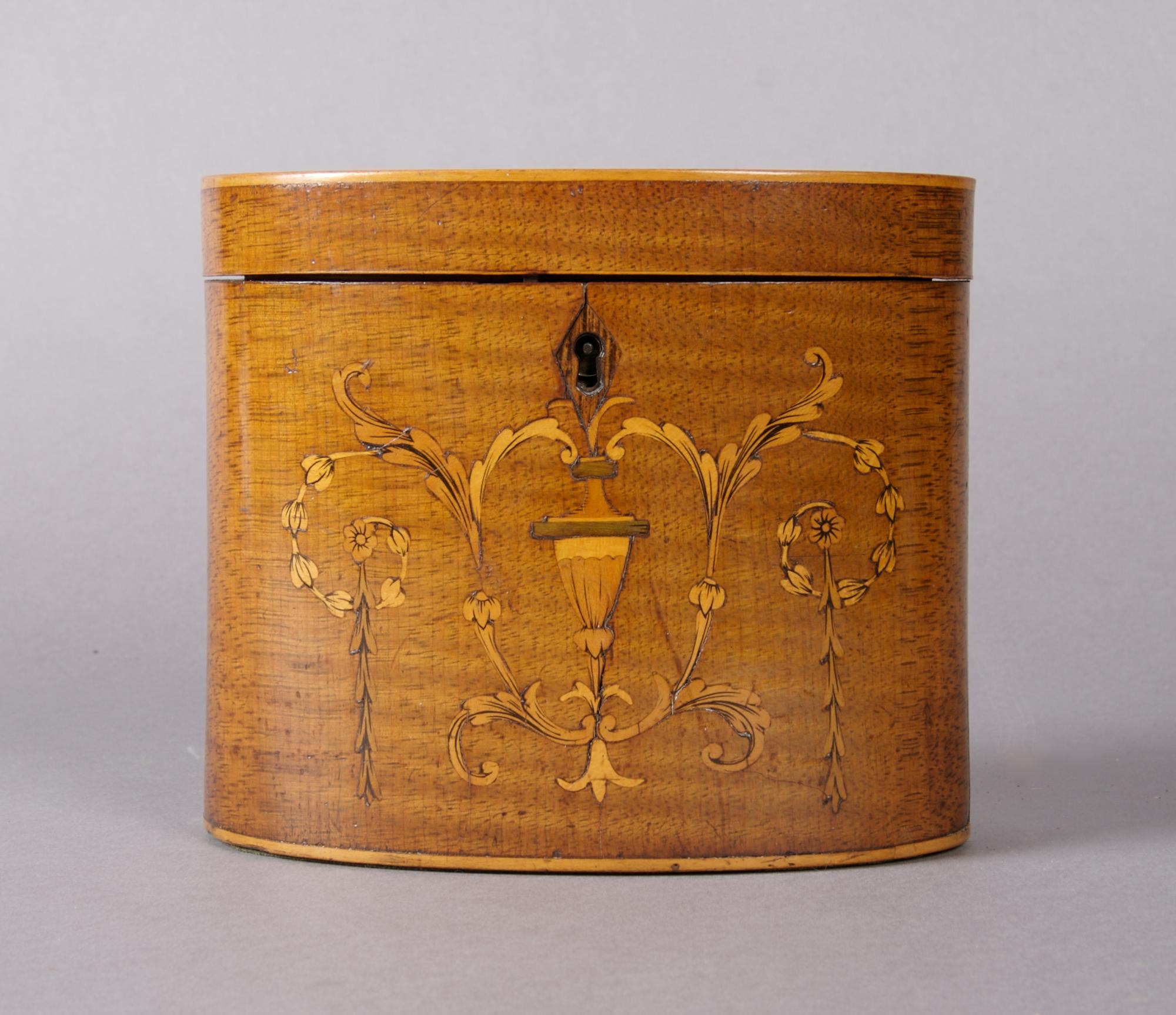 A George III Inlaid Tea Caddy, Height 4 3/4 x width 5 1/2 x depth 3 1/8 inches.