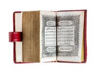(MINIATURE BOOK) A miniature Qu'ran.