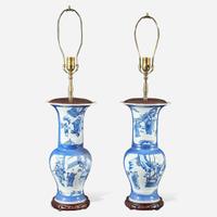 A pair of Chinese blue and white powder-blue ground “Phoenix-tail” vases mounted as lamps Kangxi style