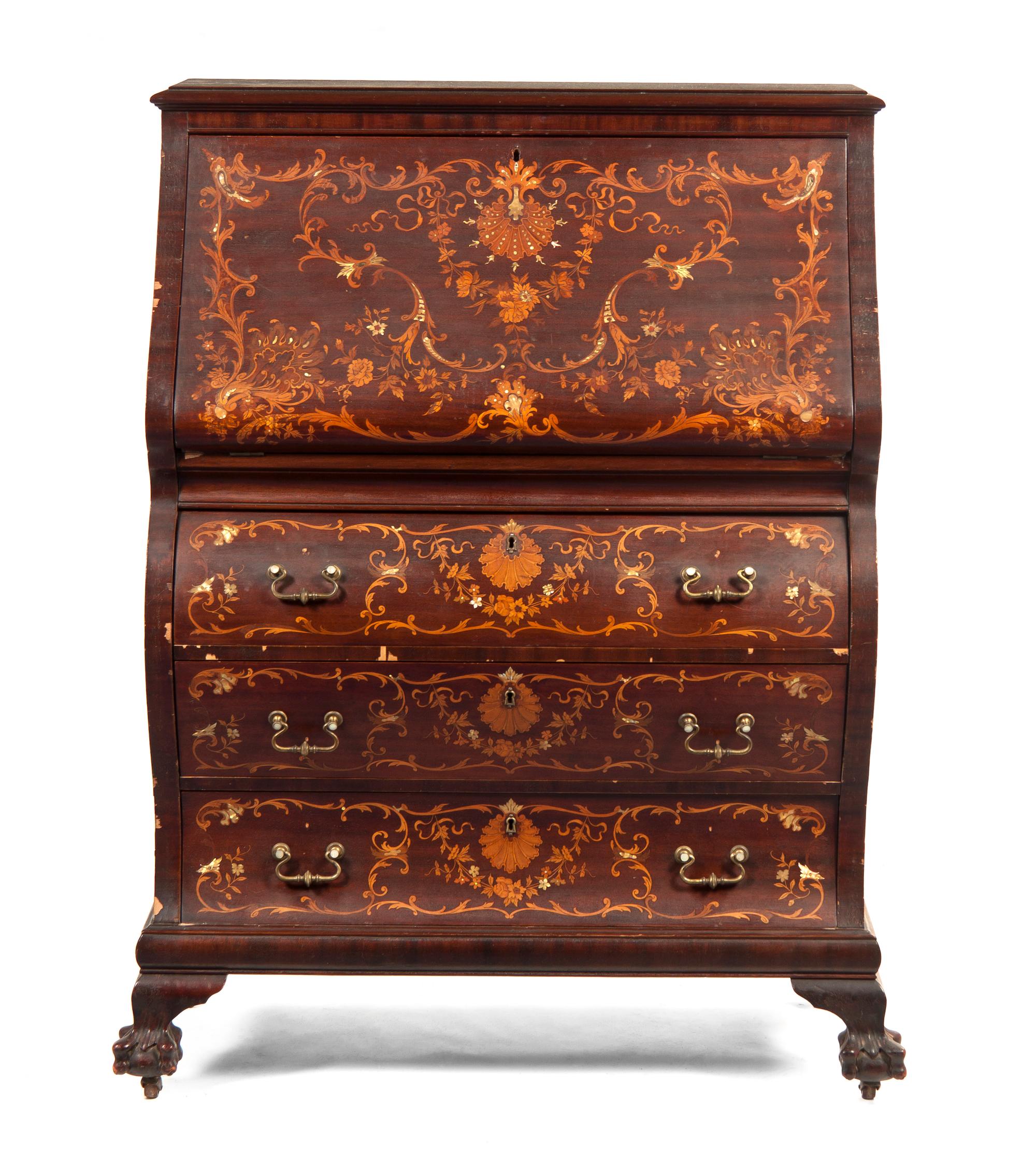 A Continental Marquetry and Mother-of-Pearl Inlaid Bureau, Height 45 1/2 x width 33 1/4 x depth 16 1/8 inches.