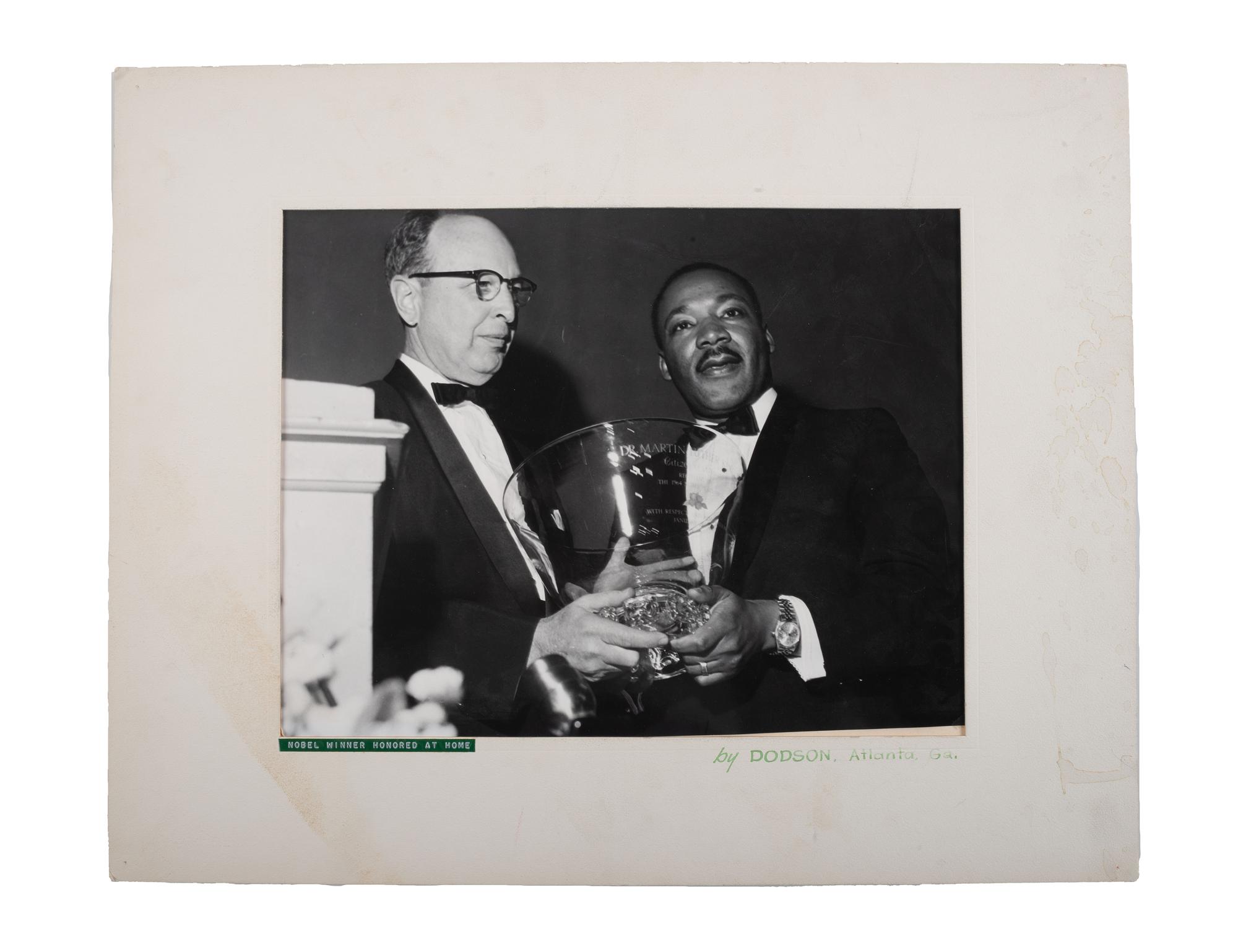 [KING, Martin Luther, Jr. (1929-1968)]. DODSON, Henry David (1932-2016), photographer. A group of 4 photographs of Dr. Martin Luther King, Jr., his family, and Ebenezer Baptist Church. Atlanta, GA, 1960s.