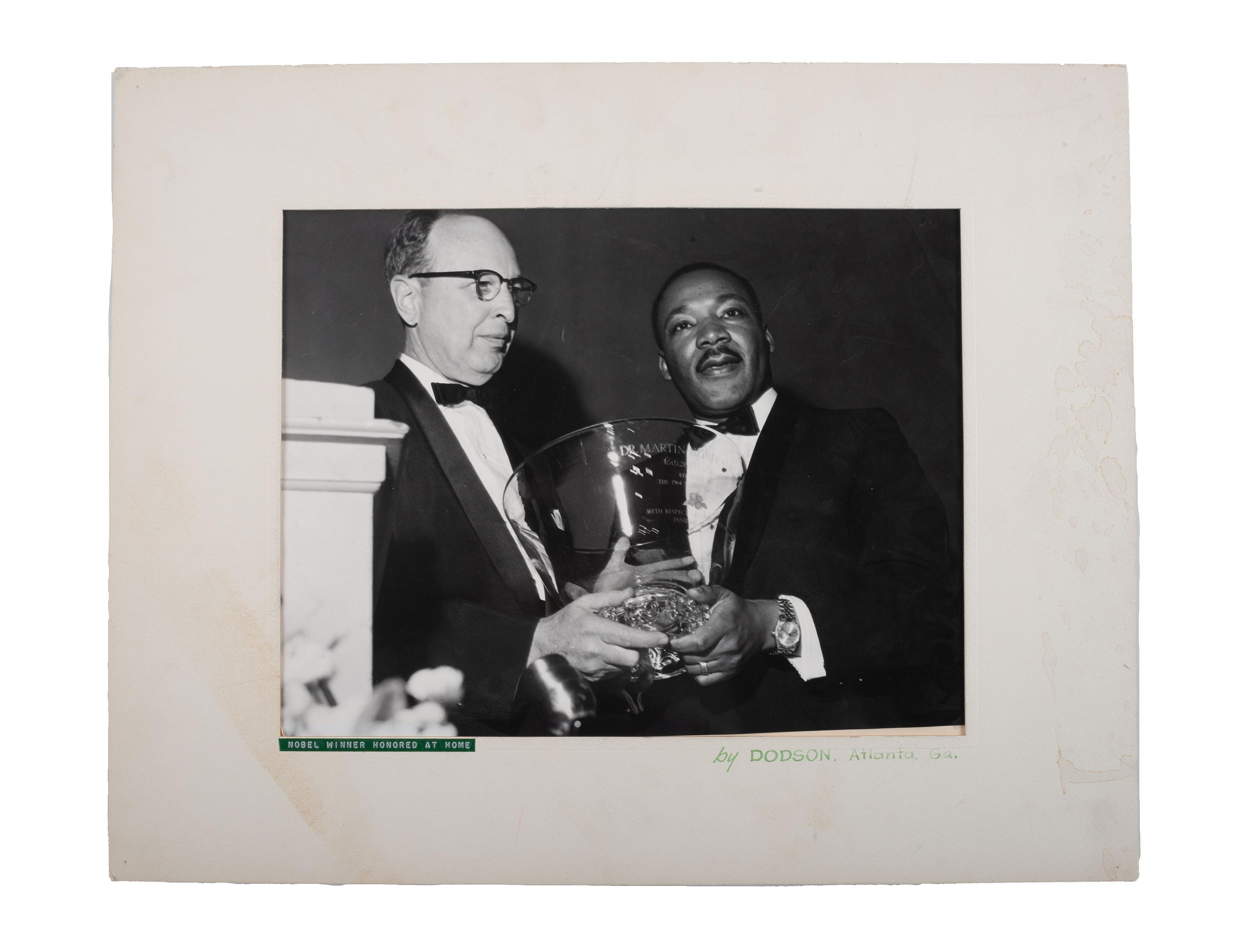 [KING, Martin Luther, Jr. (1929-1968)]. DODSON, Henry David (1932-2016), photographer. A group of 4 photographs of Dr. Martin Luther King, Jr., his family, and Ebenezer Baptist Church. Atlanta, GA, 1960s.