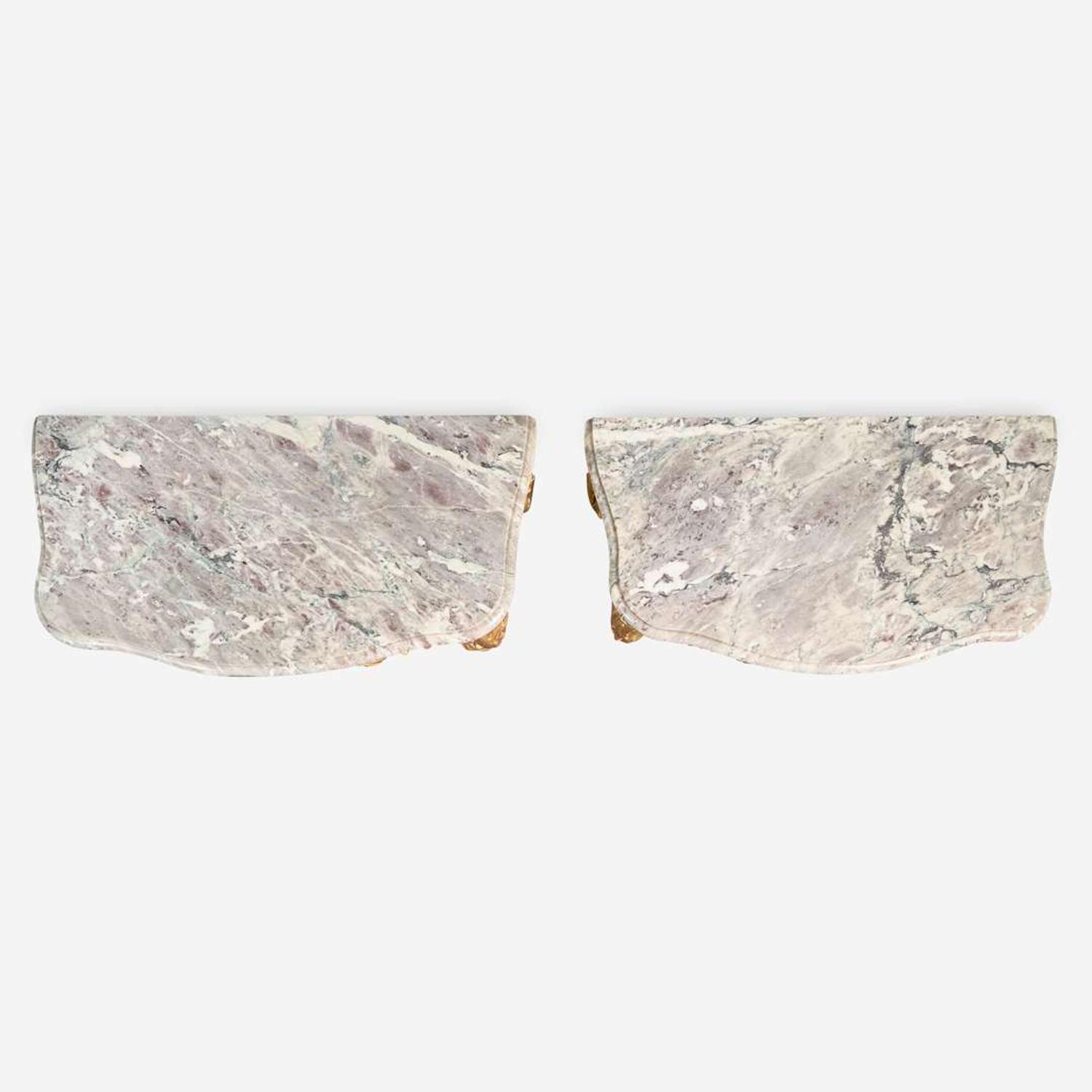 A pair of Louis XV carved giltwood consoles with breccia marble tops 18th century and possibly later