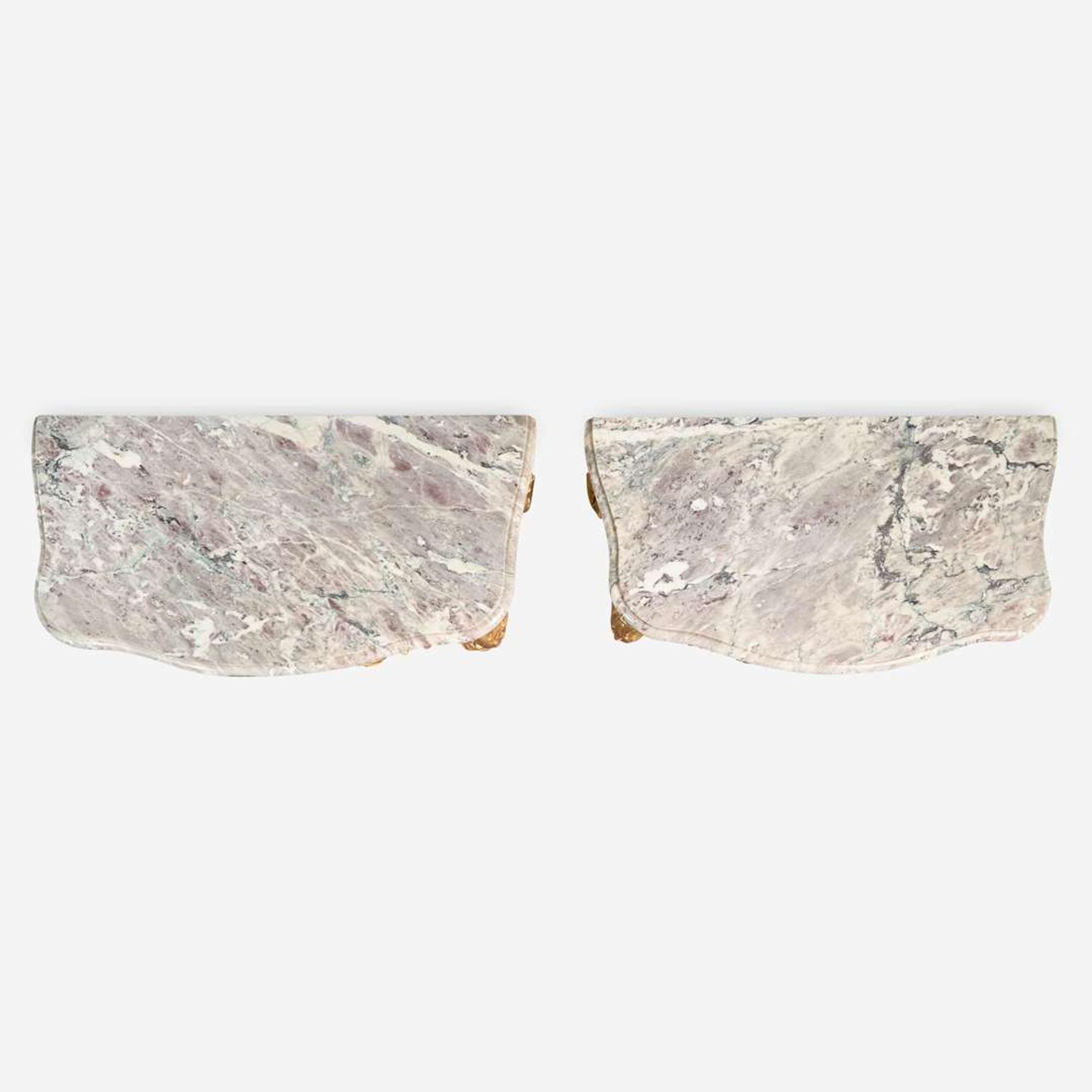 A pair of Louis XV carved giltwood consoles with breccia marble tops 18th century and possibly later