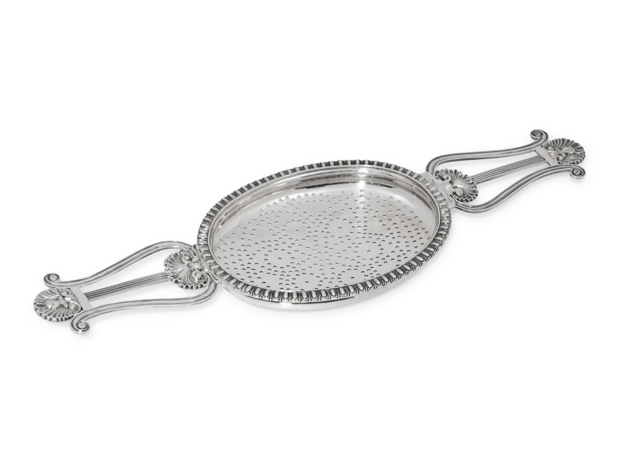 A Scottish George IV Silver Lyre Form Lemon Strainer