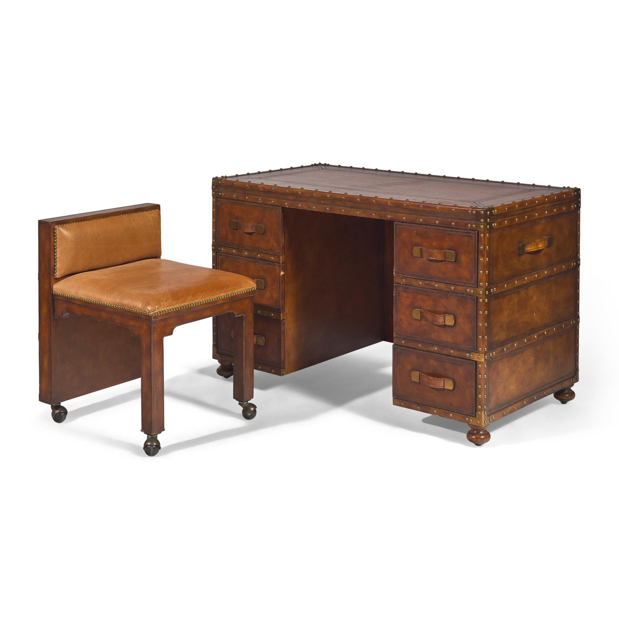 A Leather and Brass Studded Campaign-Chest Form Desk and Chair Set