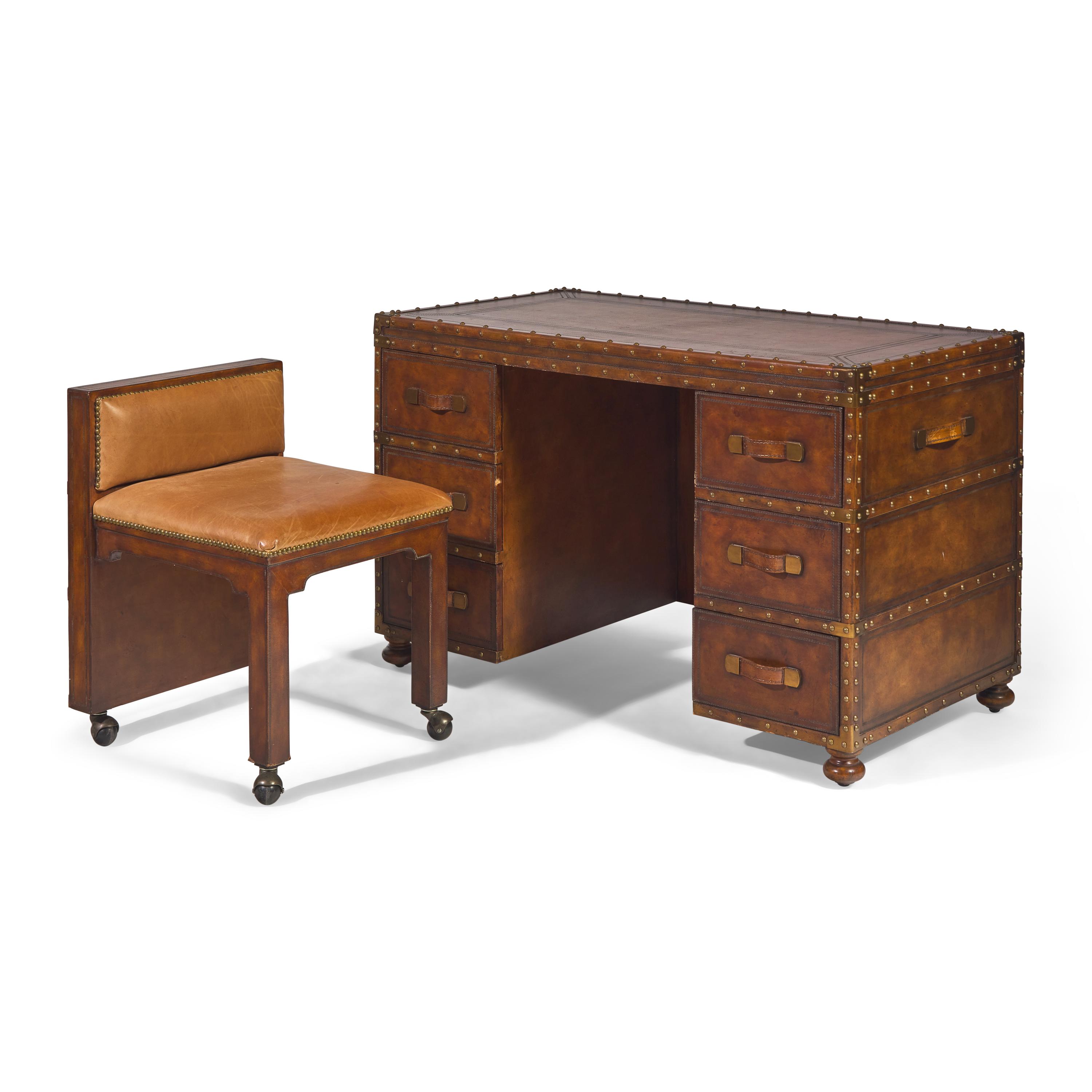 A Leather and Brass Studded Campaign-Chest Form Desk and Chair Set