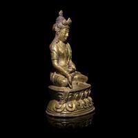 A Tibetan Gilt Copper Alloy Seated Figure of a Crowned Bodhisattva, 16th/17th Century 十六/十七世紀 西藏銅鎏金坐佛