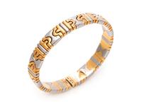 BVLGARI, YELLOW GOLD AND STEEL 'PARENTESI' CUFF BRACELET