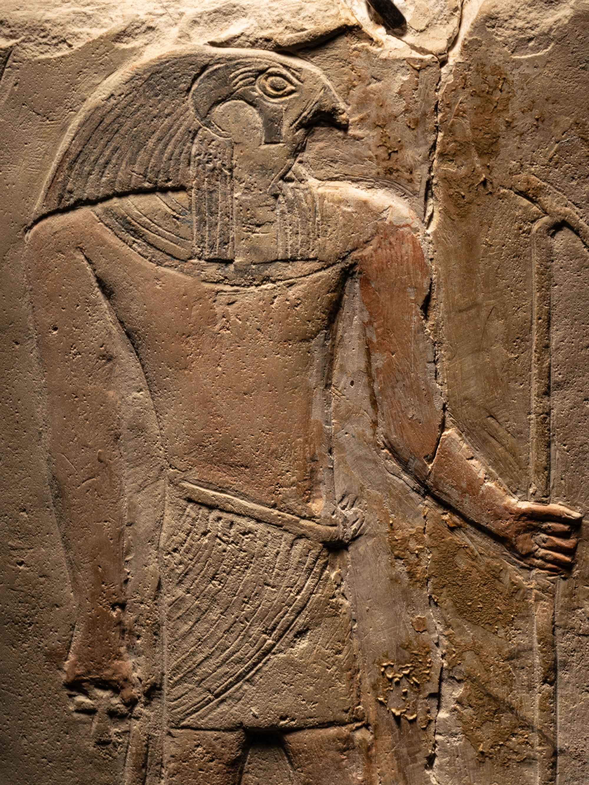 An Egyptian Limestone Round-Topped Stele