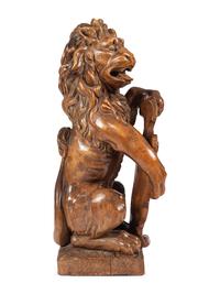 A Carved Wood Lion Newel Post Figure