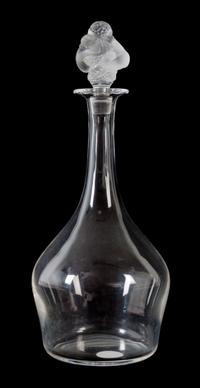 A Lalique Molded and Frosted Glass Decanter Height 12 3/4 inches. — 20TH CENTURY