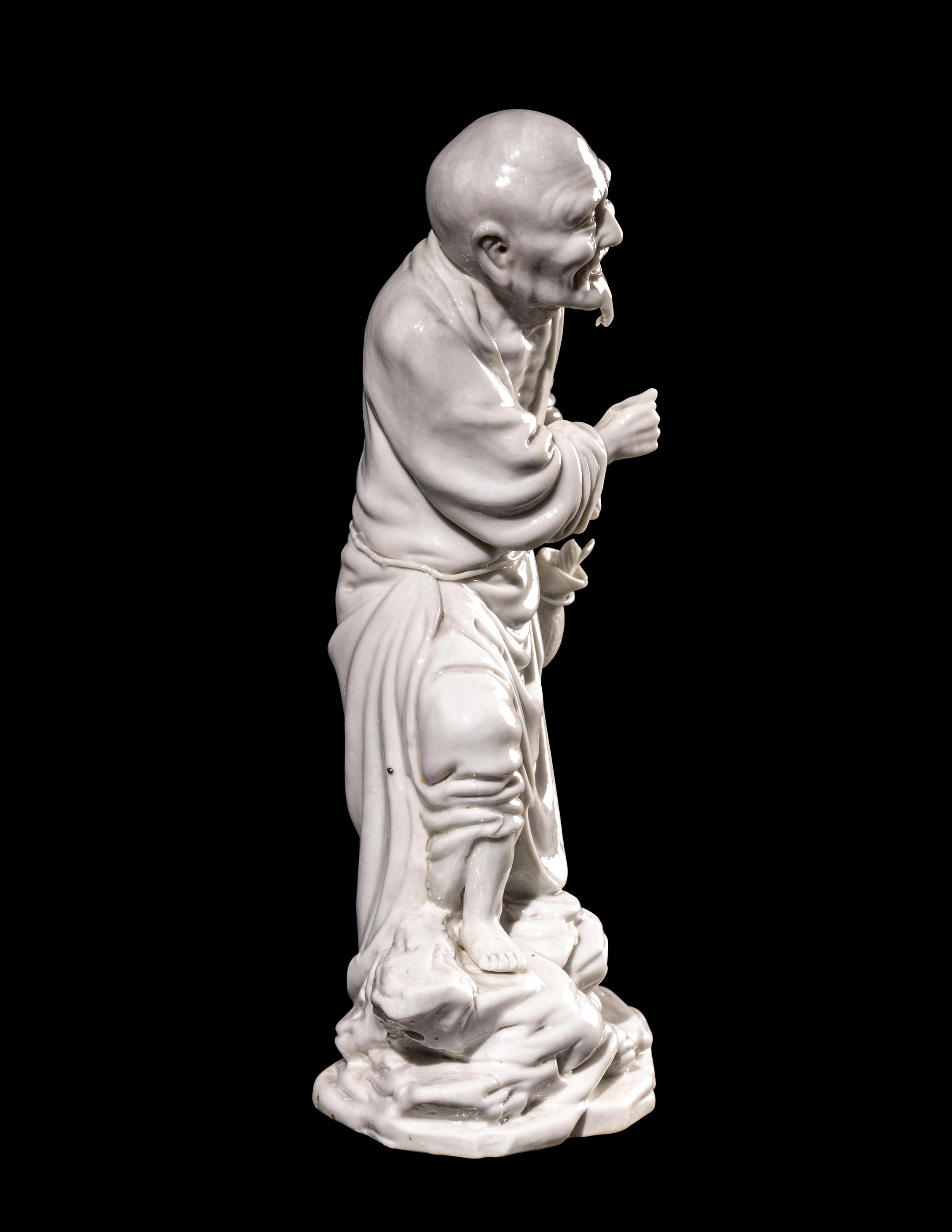 A Chinese Blanc-de-Chine Porcelain Figure of a Fisherman