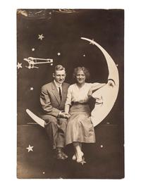 [EARLY PHOTOGRAPHY]. A group of 59 real photo postcards, featuring artfully posed images of women, famous subjects, and genre scenes celebrating romance and the holiday season.