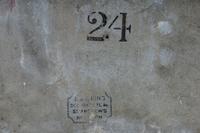 A Set of Seven Tôle Peinte Wall Appliques