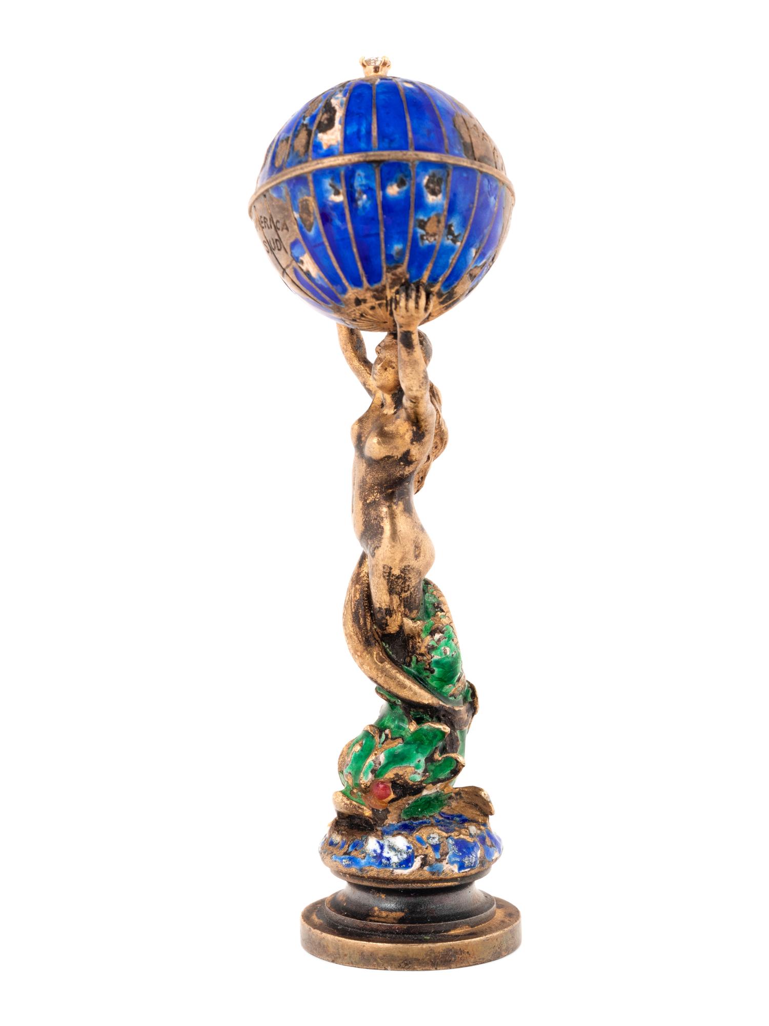 A French Enameled Silver and Diamond-Mounted Figural Hand Seal