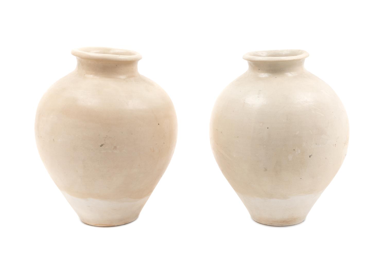 A Pair of Ovoid Jars Height 11 inches. — TANG DYNASTY (618-907 C.E.)