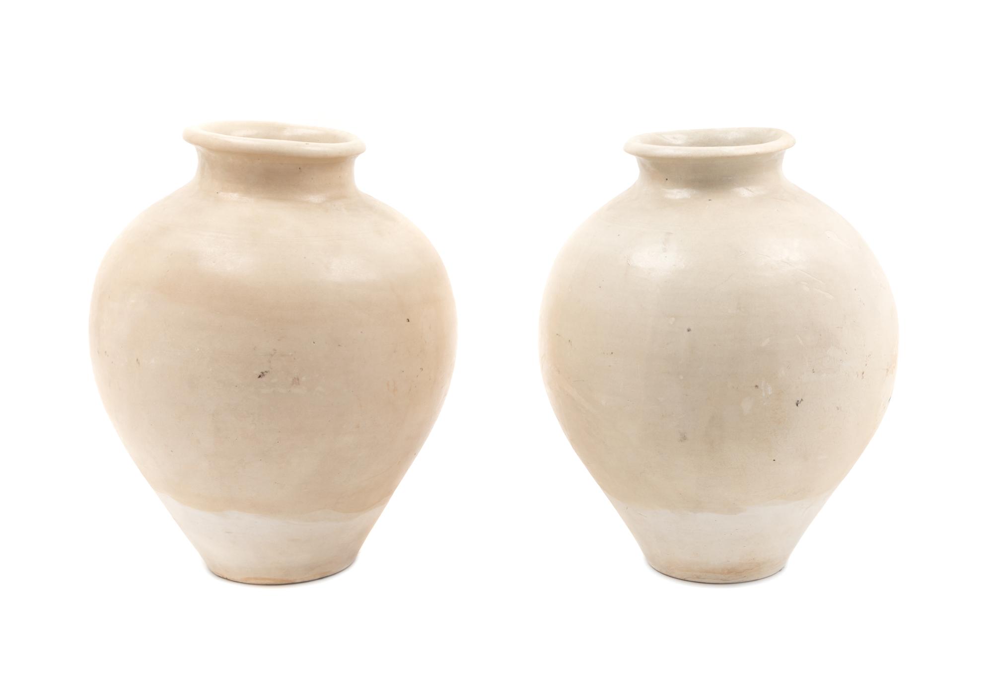 A Pair of Ovoid Jars Height 11 inches. — TANG DYNASTY (618-907 C.E.)