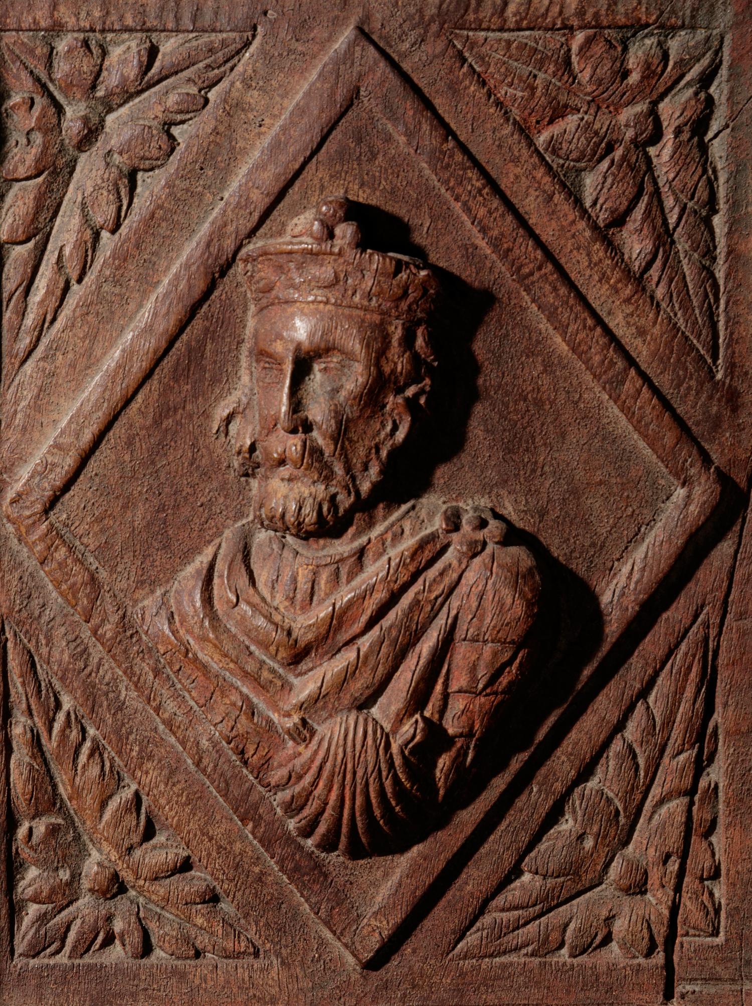 A Continental Terra Cotta Panel Cast from a Cabinet Door