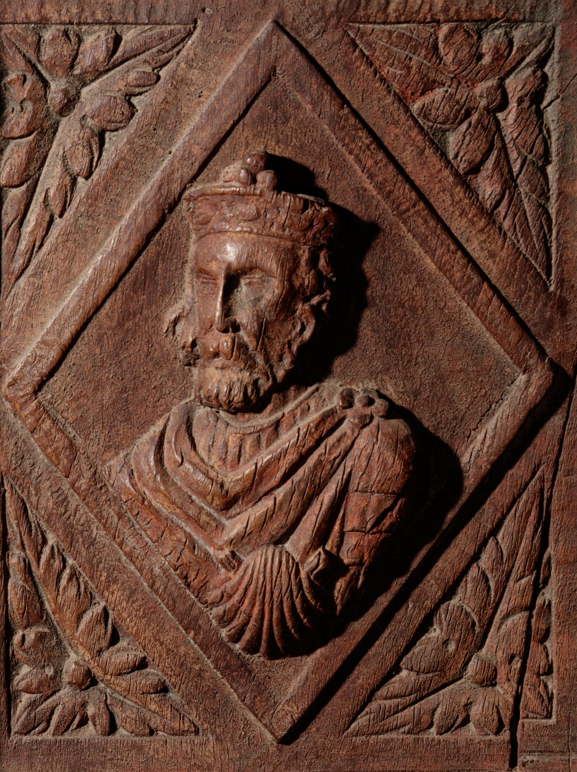 A Continental Terra Cotta Panel Cast from a Cabinet Door