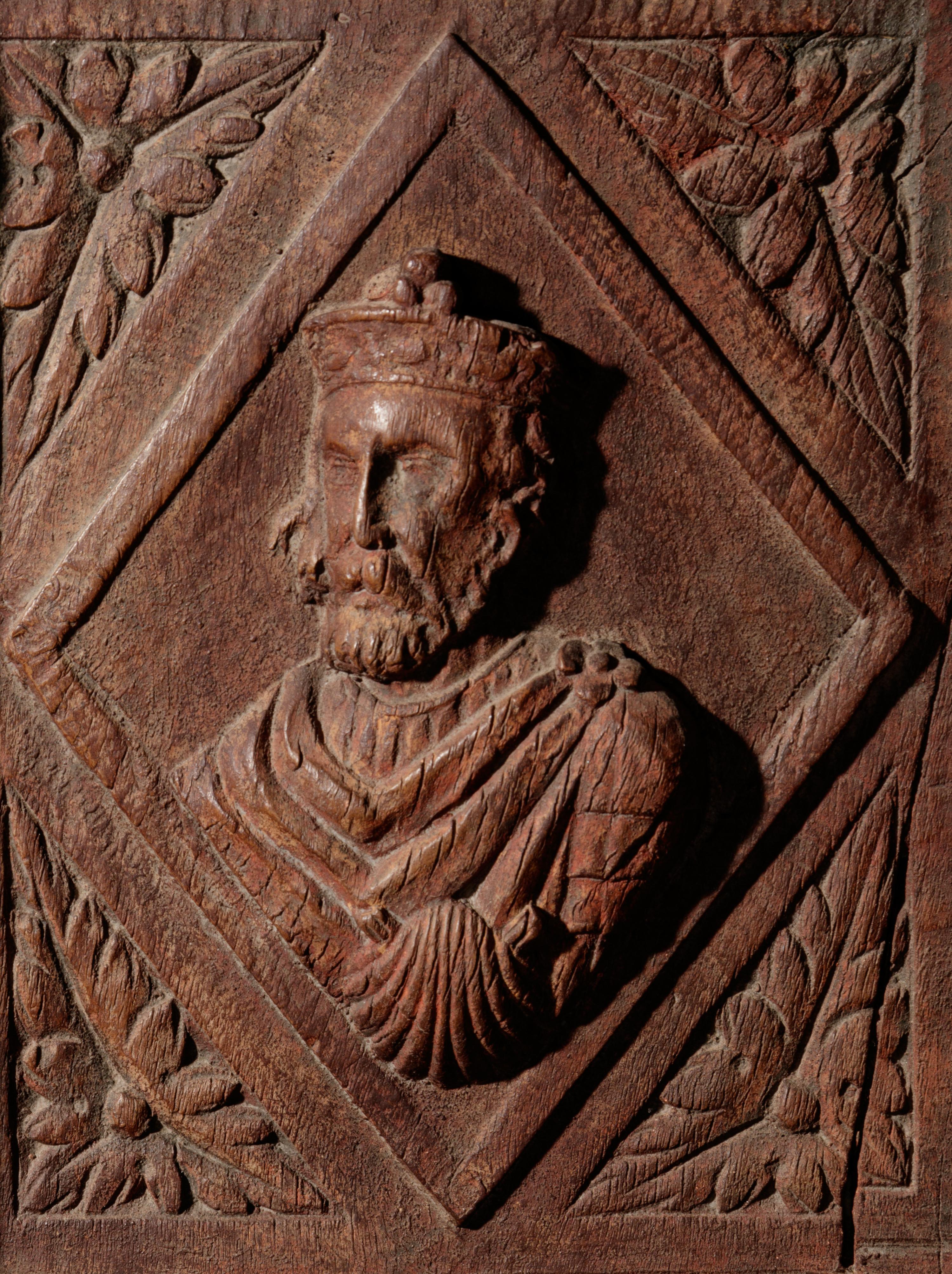 A Continental Terra Cotta Panel Cast from a Cabinet Door