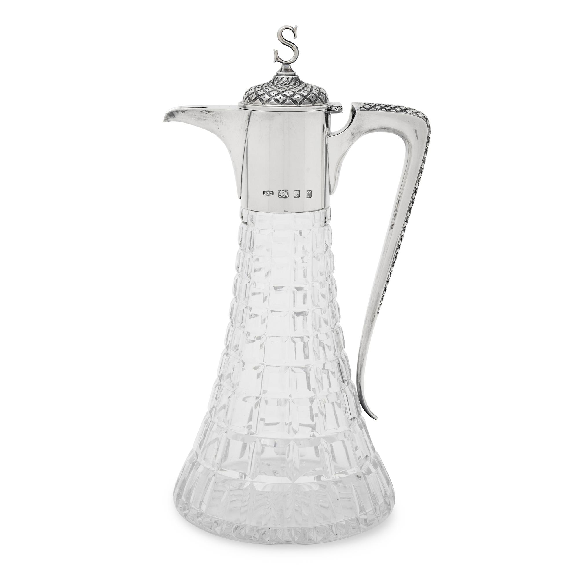 An English Silver Mounted Cut Glass Claret Jug