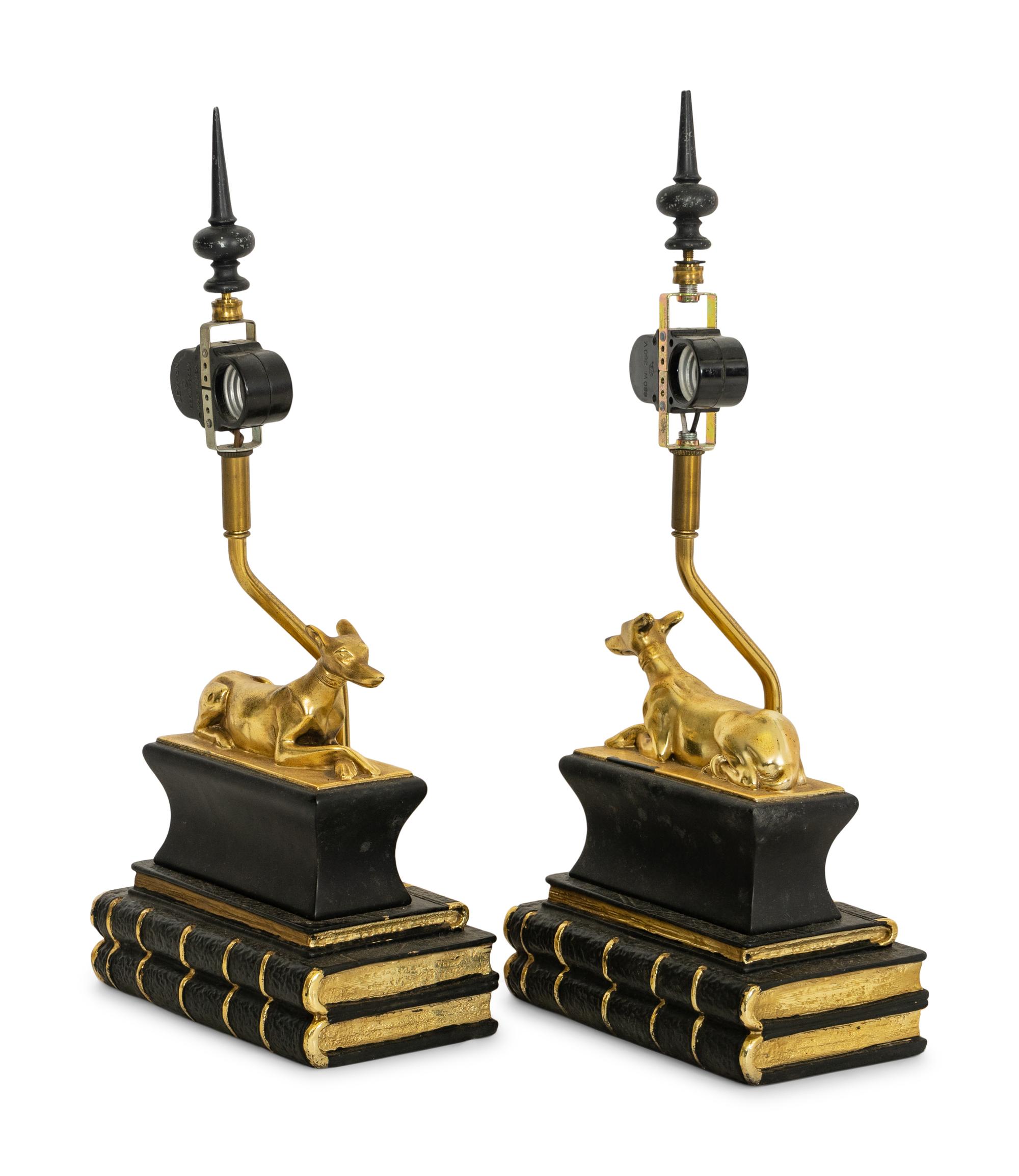 A Pair of Chapman Parcel Gilt Recumbent Canine Lamps