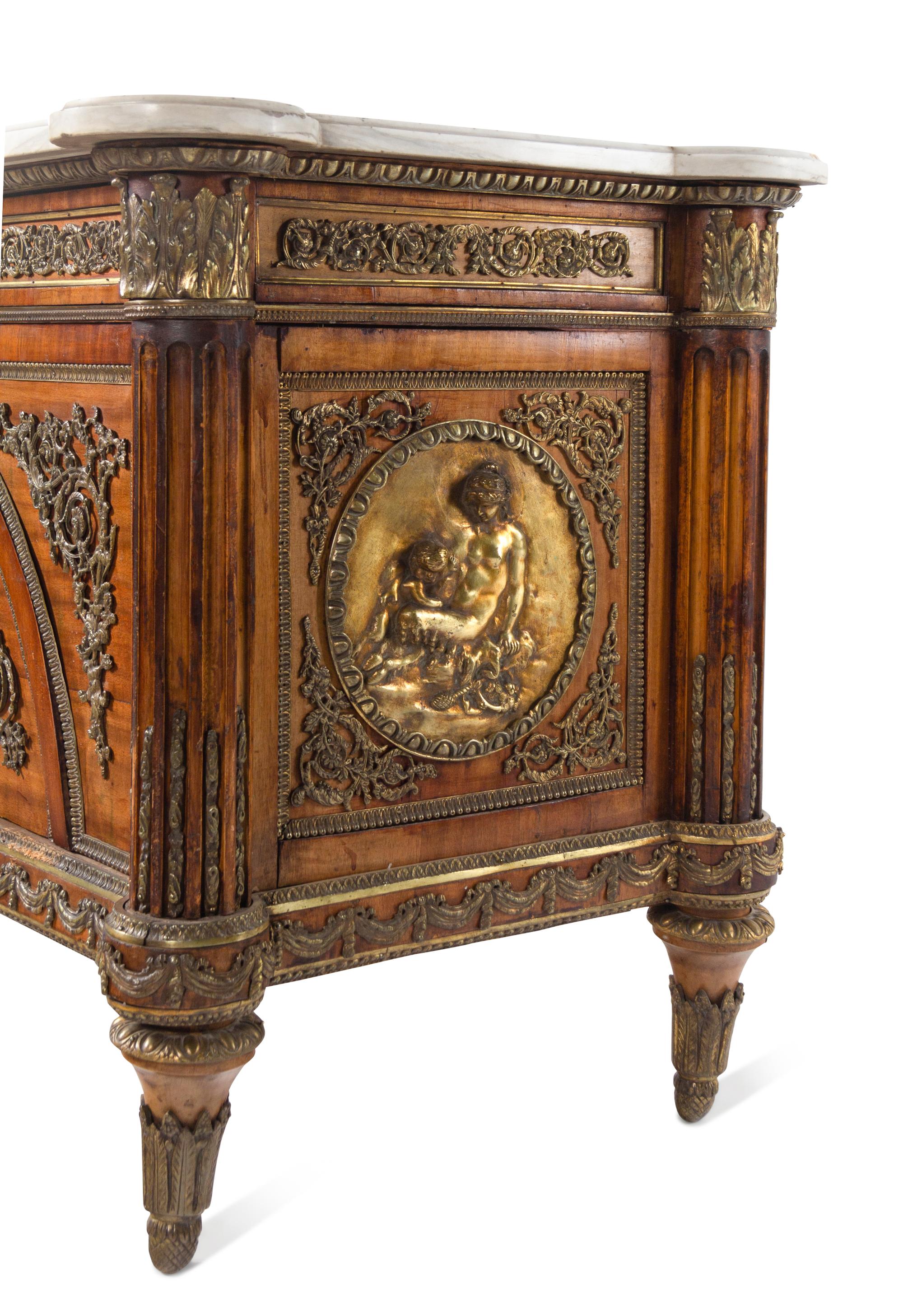 A Louis XVI Style Gilt Bronze Mounted Mahogany Marble-Top Commode à Vantaux