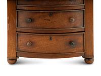 A Regency Mahogany Diminutive Bowfront Chest of Drawers