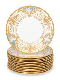 A Set of Twelve Mintons Pâte-sur-Pâte Parcel-Gilt Porcelain Plates