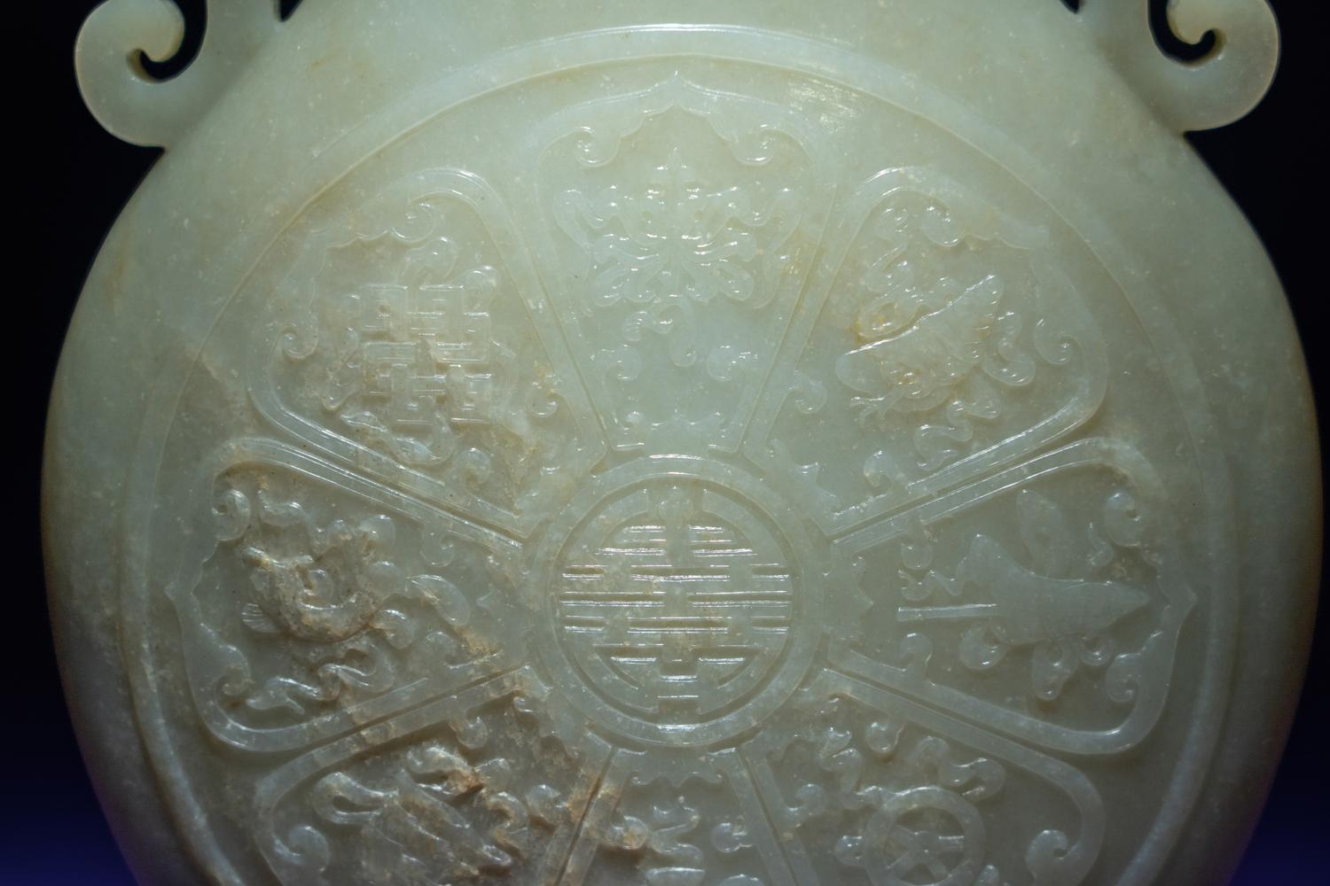 A Rare and Finely Carved Chinese White Jade Covered Vase