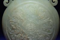 A Rare and Finely Carved Chinese White Jade Covered Vase