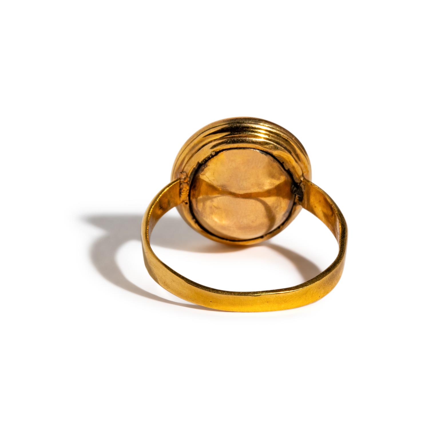 A Roman Glass Ring Stone with a Male Portrait Head — Set in a gold ring
