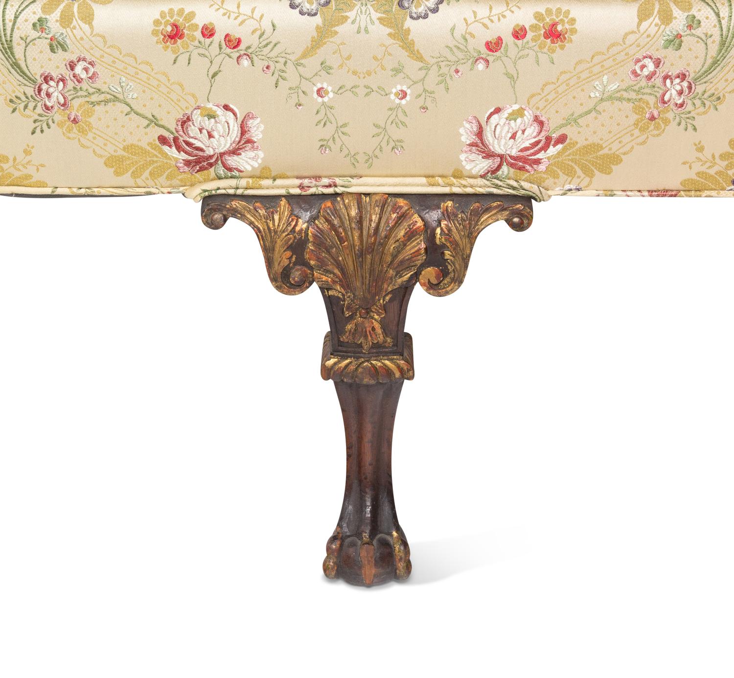 A Pair of George II Style Parcel-Gilt Walnut Settees