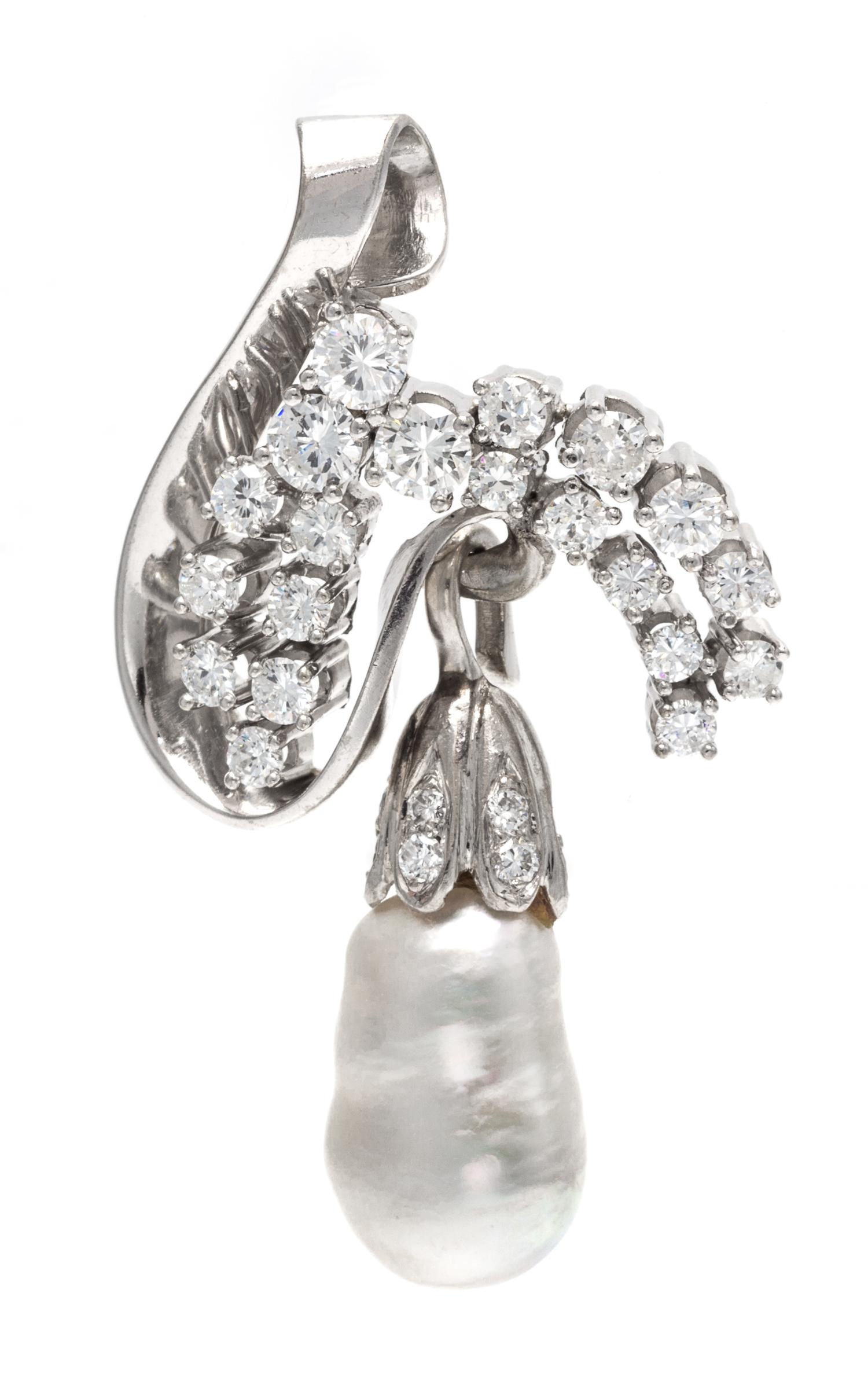 A 14 Karat White Gold, Diamond and Cultured Pearl Pendant, 7.30 dwts.