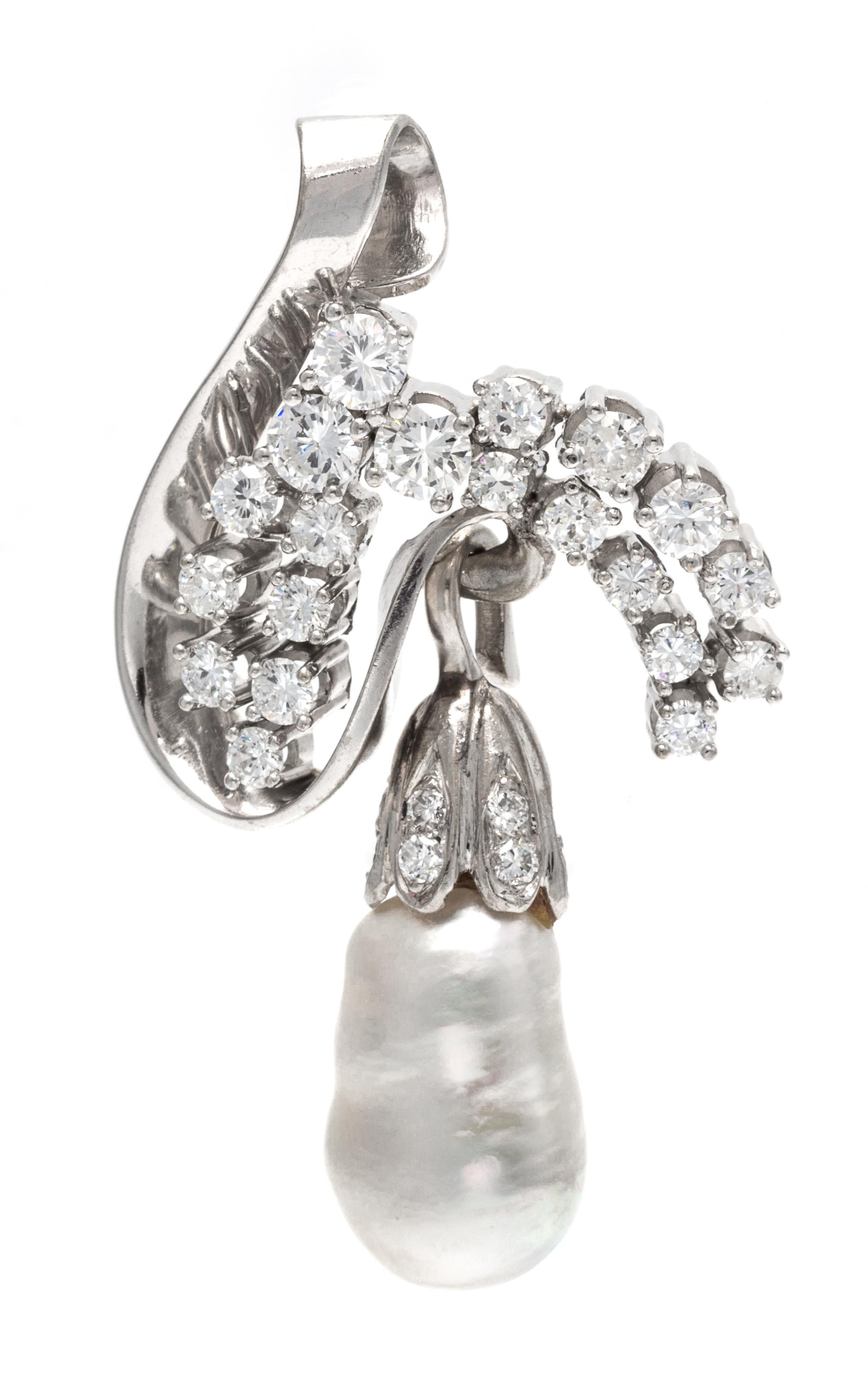 A 14 Karat White Gold, Diamond and Cultured Pearl Pendant, 7.30 dwts.