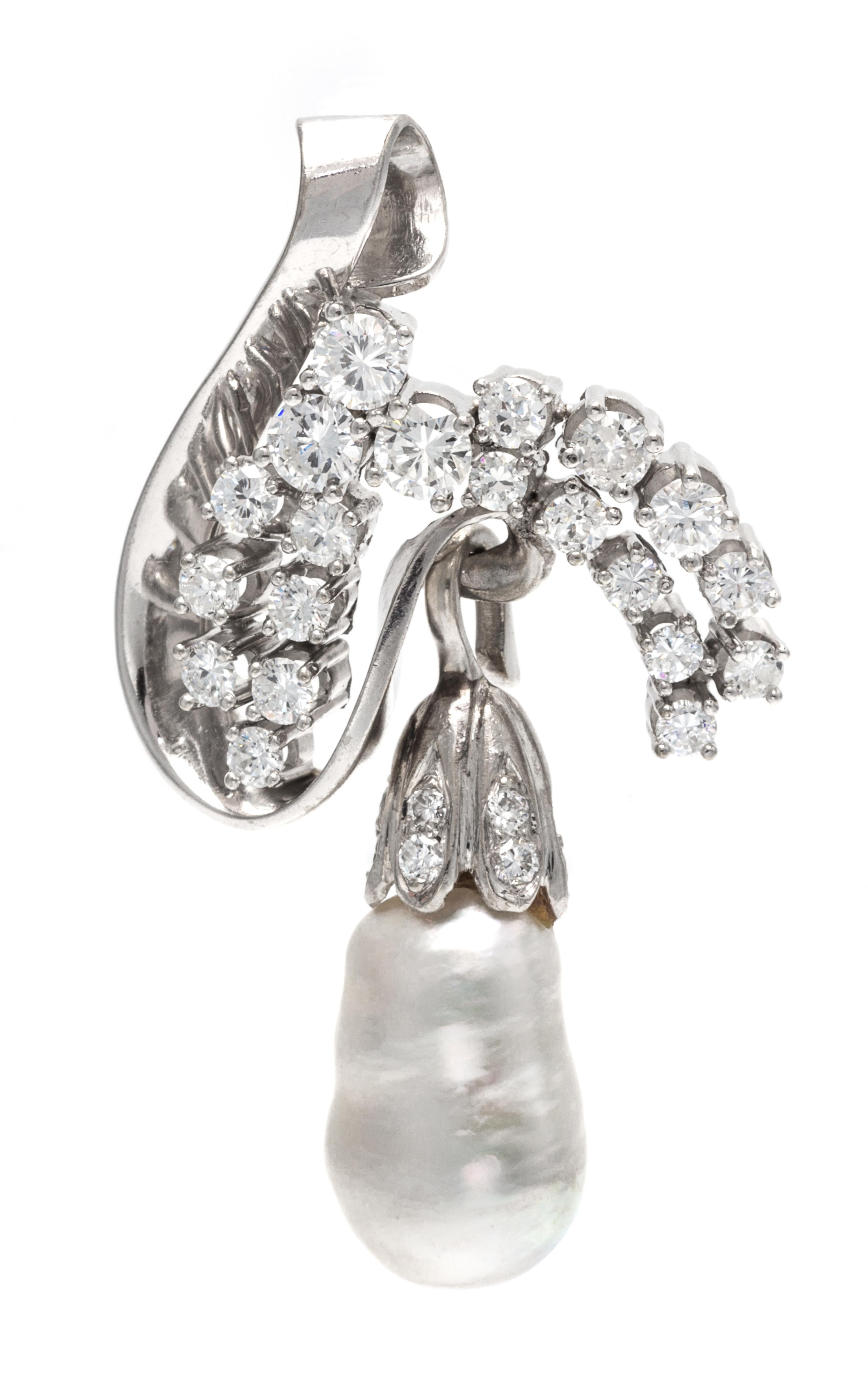 A 14 Karat White Gold, Diamond and Cultured Pearl Pendant, 7.30 dwts.