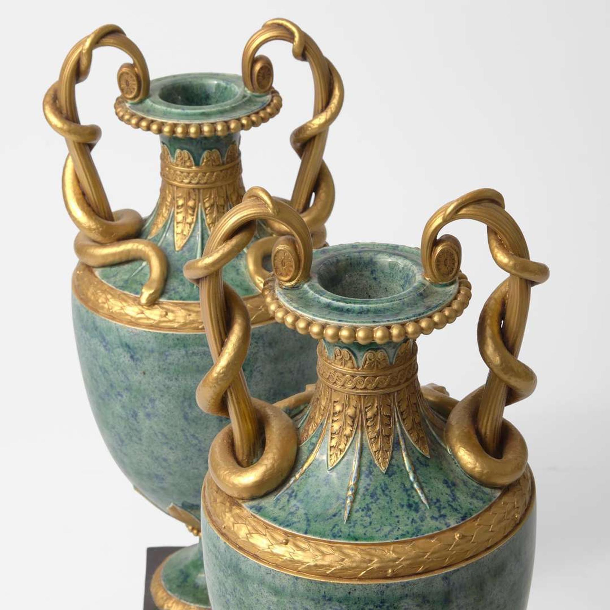 A Pair of Wedgwood Simulated Porphyry Snake-Handled Vases UK, circa 1790 and later