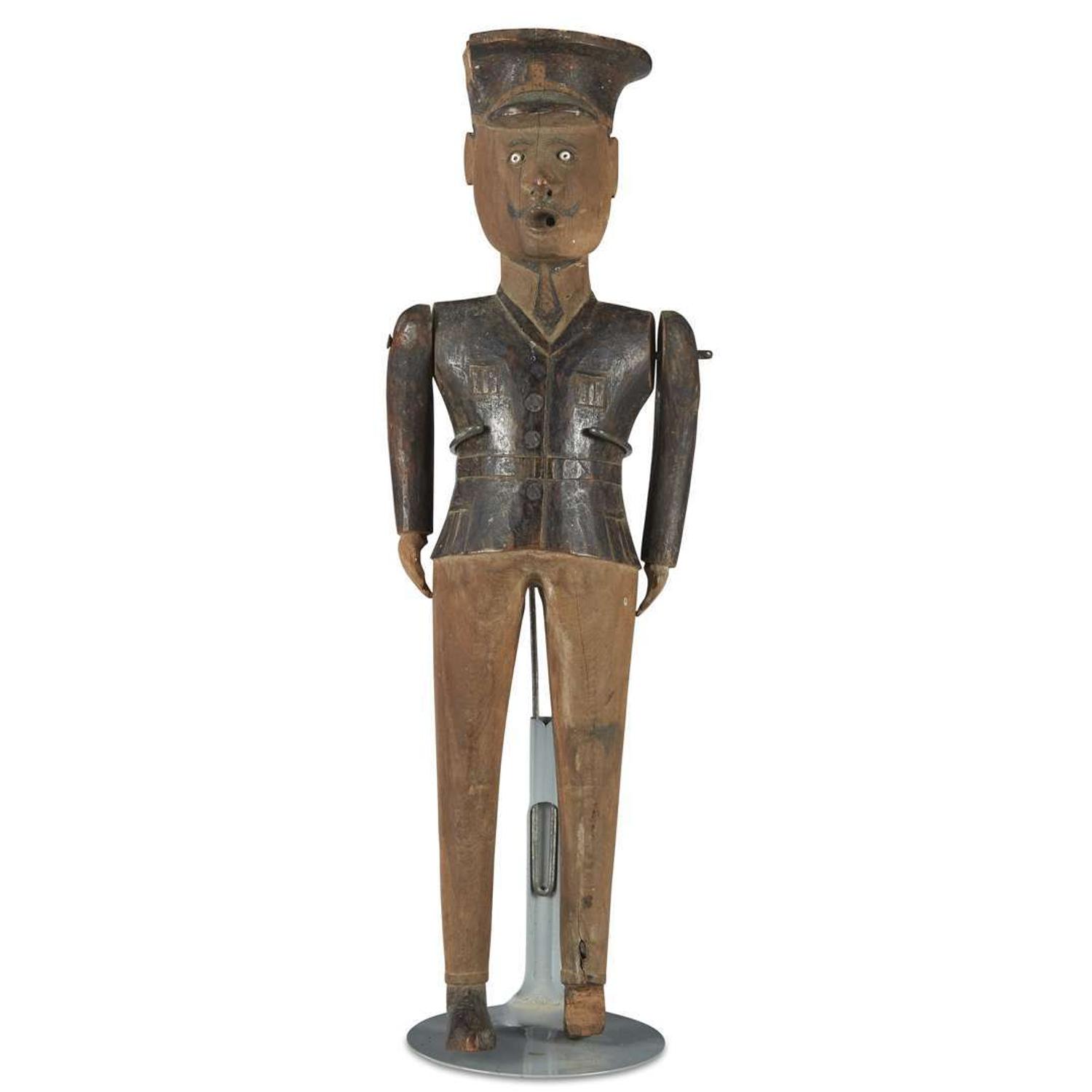 Carved and painted figure of a WWII officer 20th century
