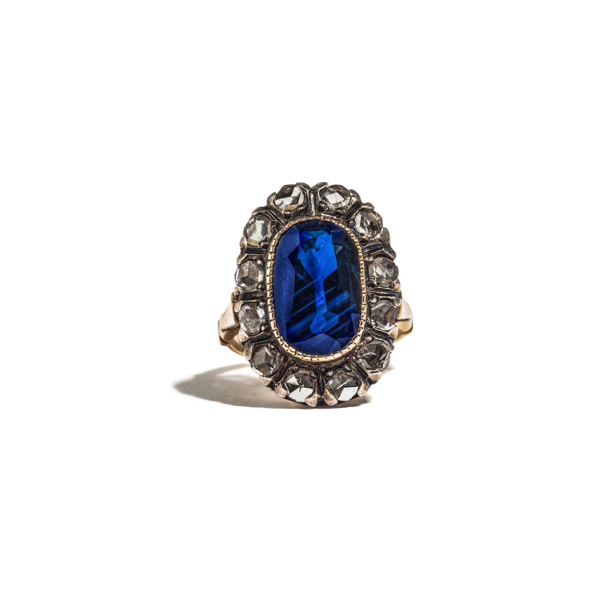 SILVER-TOPPED GOLD, SAPPHIRE AND DIAMOND RING