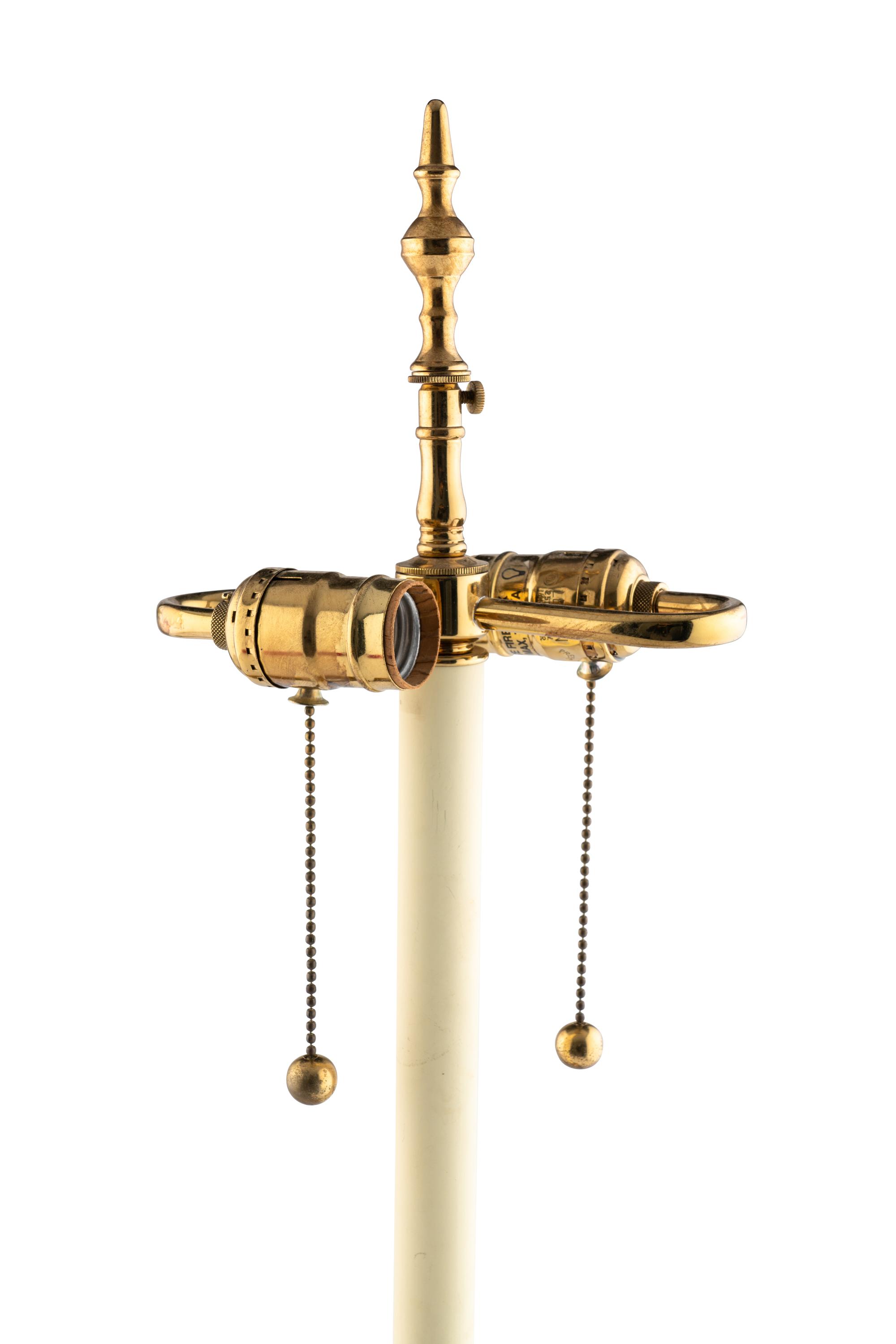 A Pair of Brass Columnar Lamps