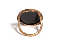 A Neoclassical Gold and Onyx Cameo Ring with a Sphinx