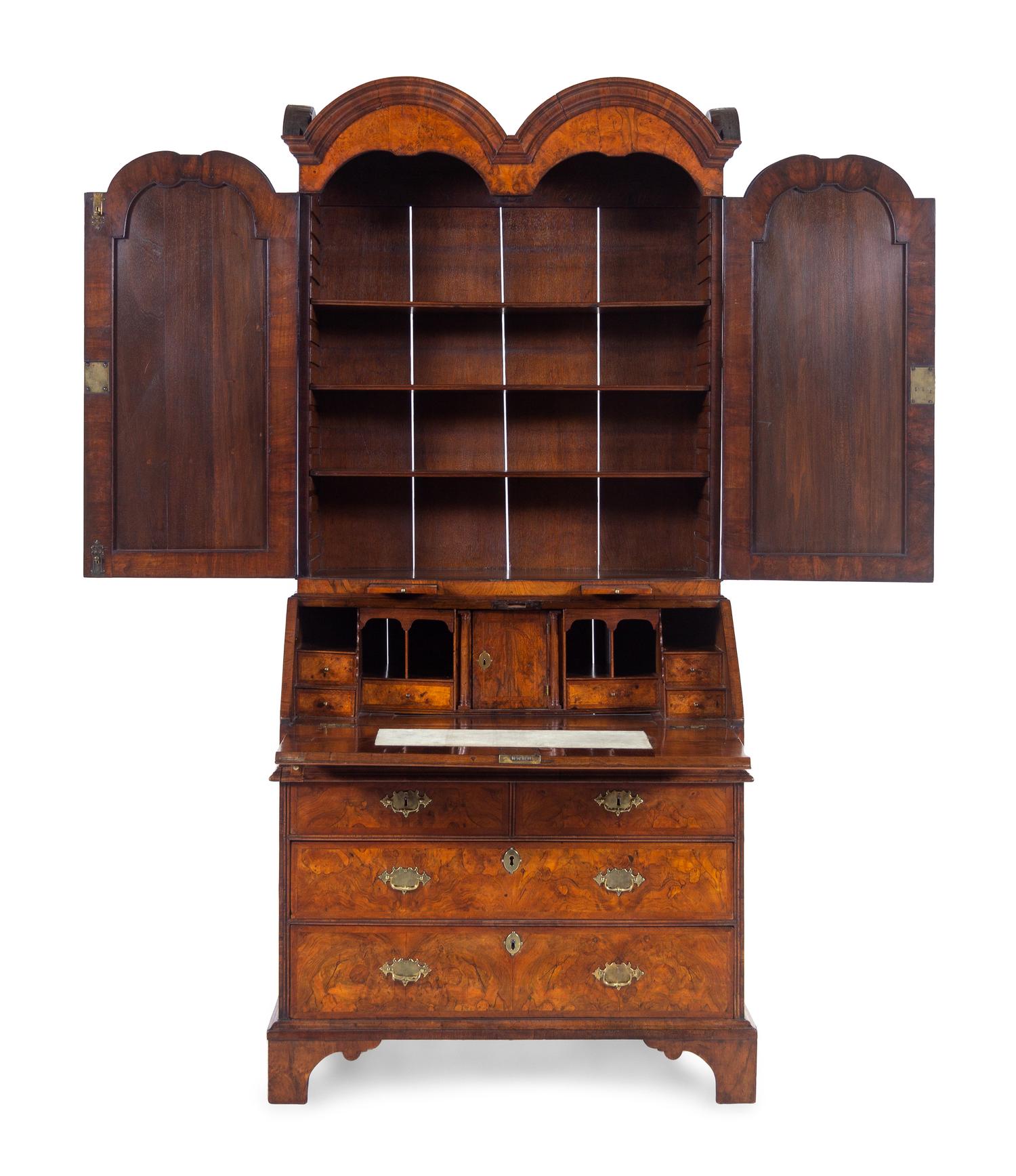 A George I Carved Burl Walnut Double-Dome Bureau Bookcase