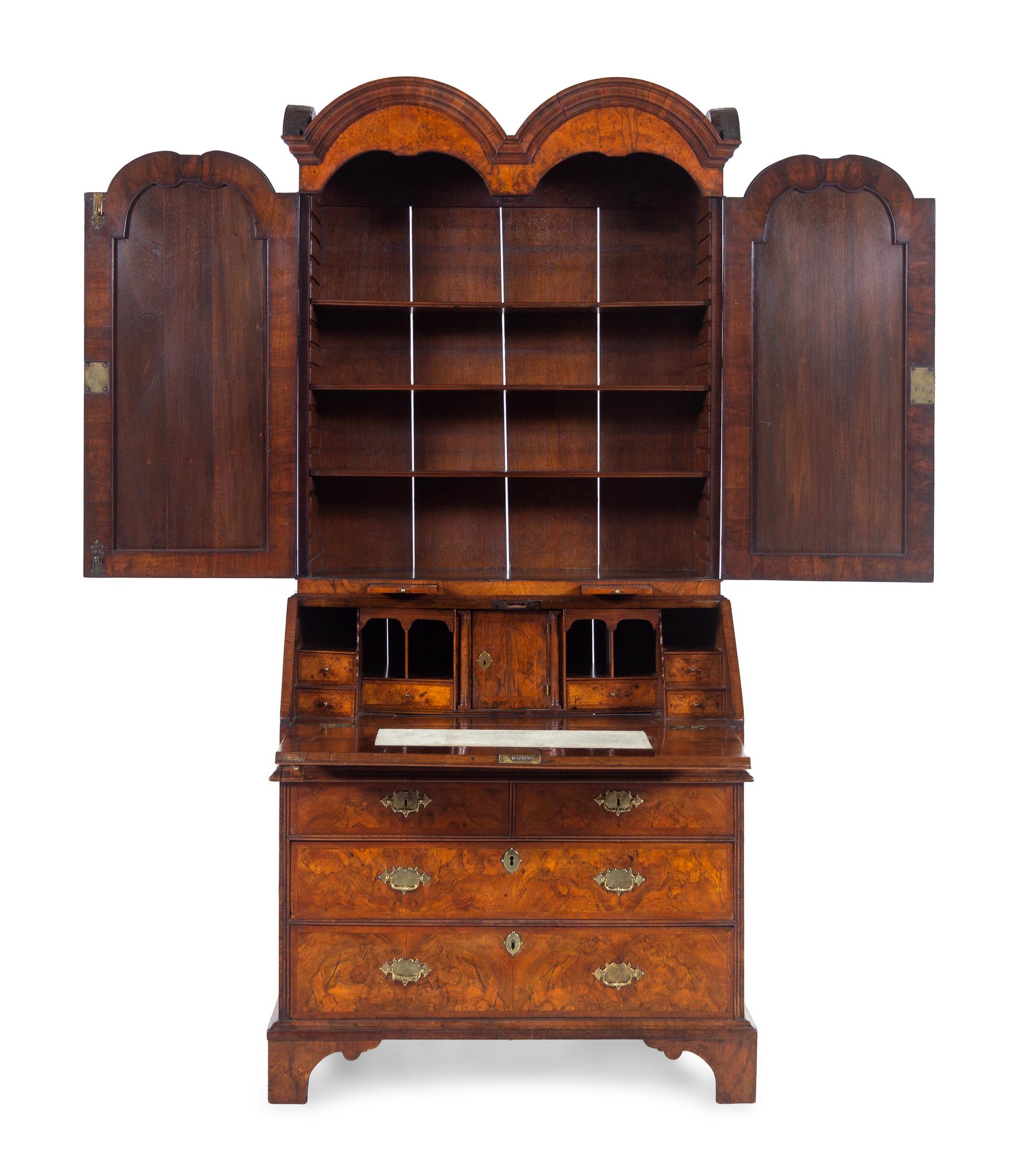 A George I Carved Burl Walnut Double-Dome Bureau Bookcase