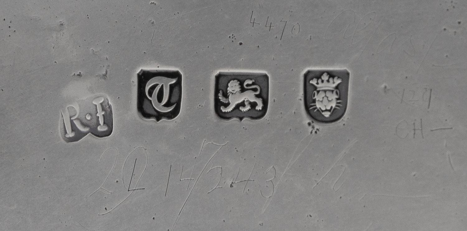 An English Silver Salver, Robert Jones I, London, 1774, raised on paw feet.