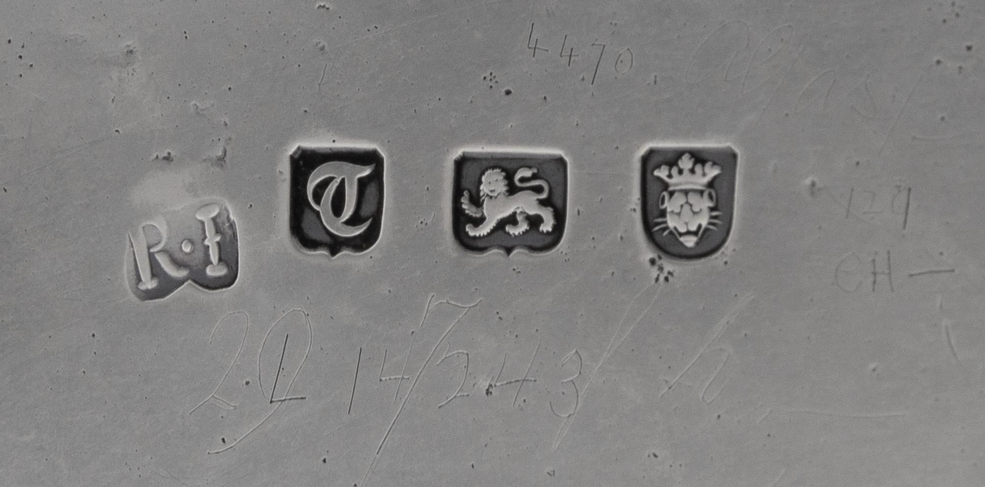 An English Silver Salver, Robert Jones I, London, 1774, raised on paw feet.